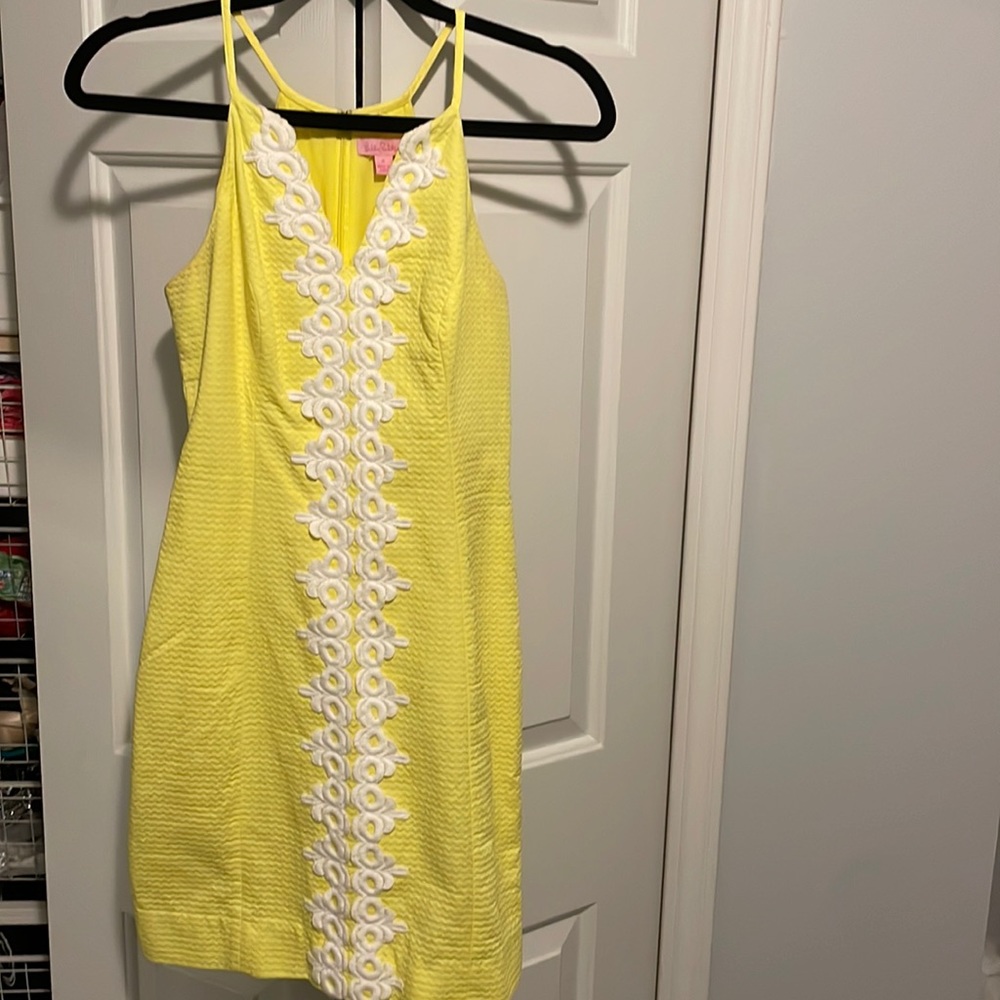 Yellow Lilly dress with white lace up the front